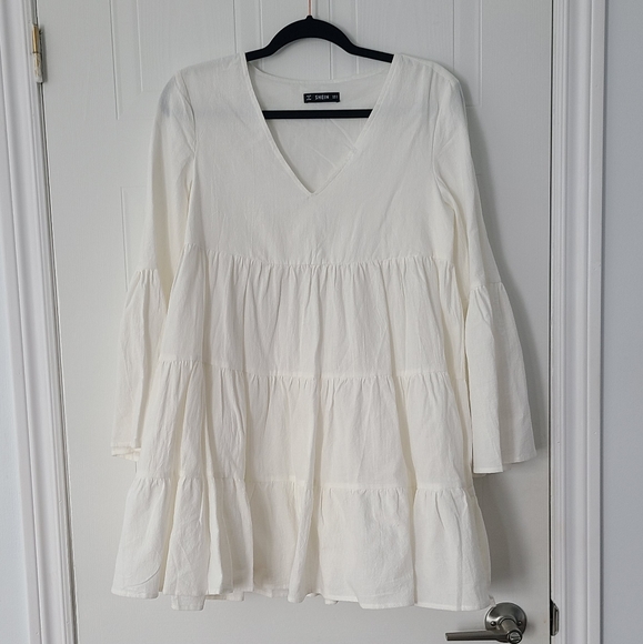 V-neck Bell sleeve stock dress - Picture 6 of 6